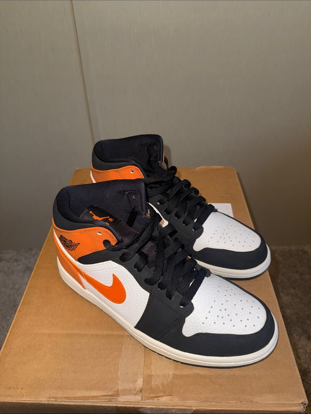 Jordan Mid-Top Sneakers in White, Black & Orange